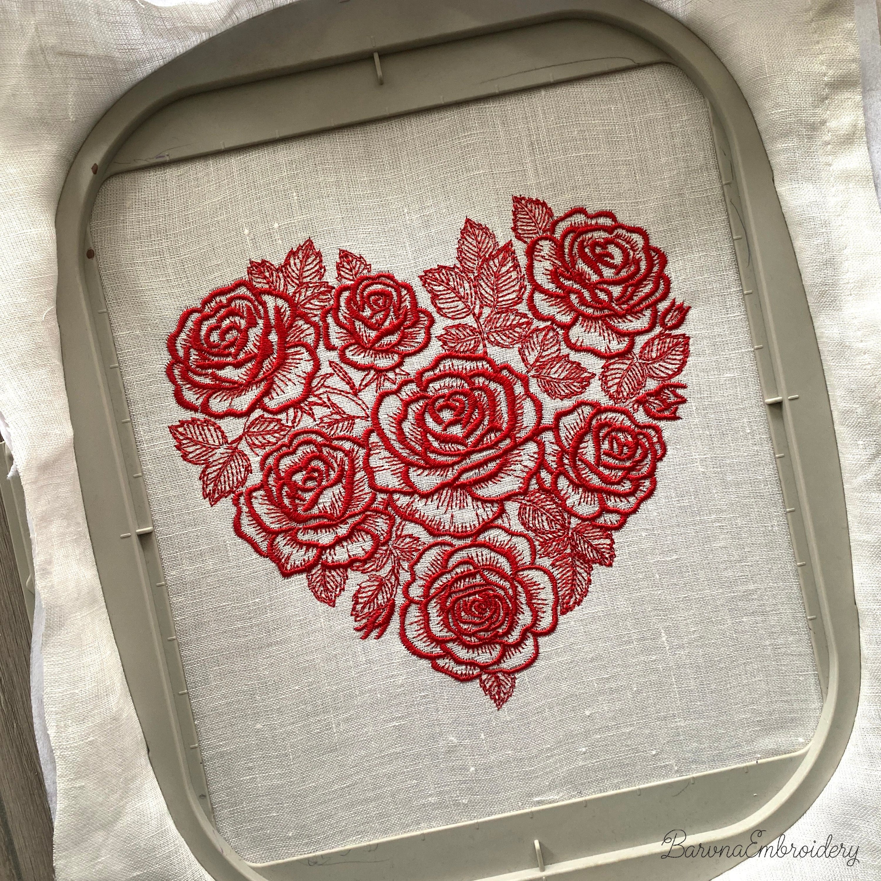 Red floral heart machine embroidery design with detailed flowers in a single color style, romantic love themed embroidery pattern.