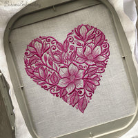 Floral heart machine embroidery design in one color with soft botanical shapes, elegant love themed embroidery pattern.