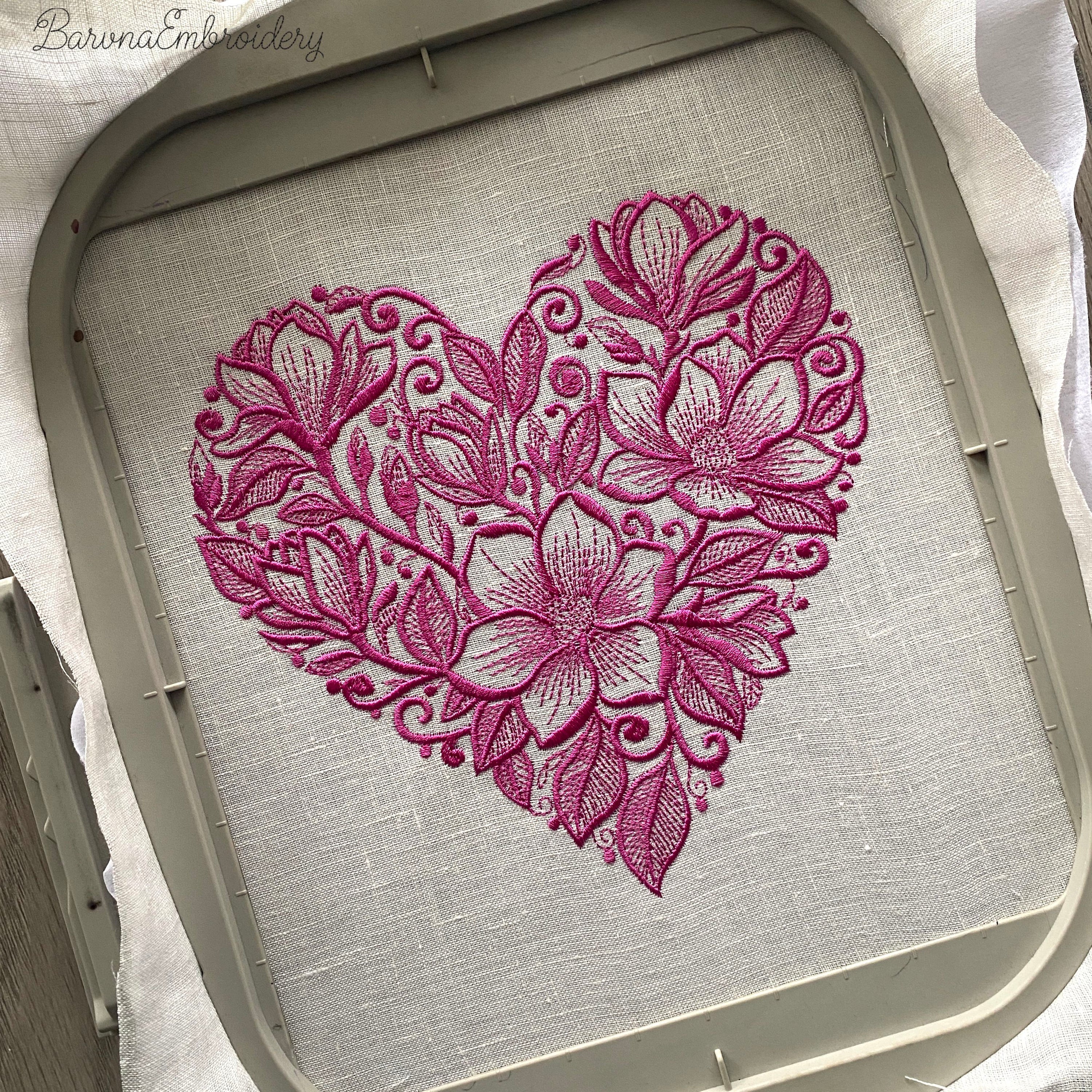Floral heart machine embroidery design in one color with soft botanical shapes, elegant love themed embroidery pattern.
