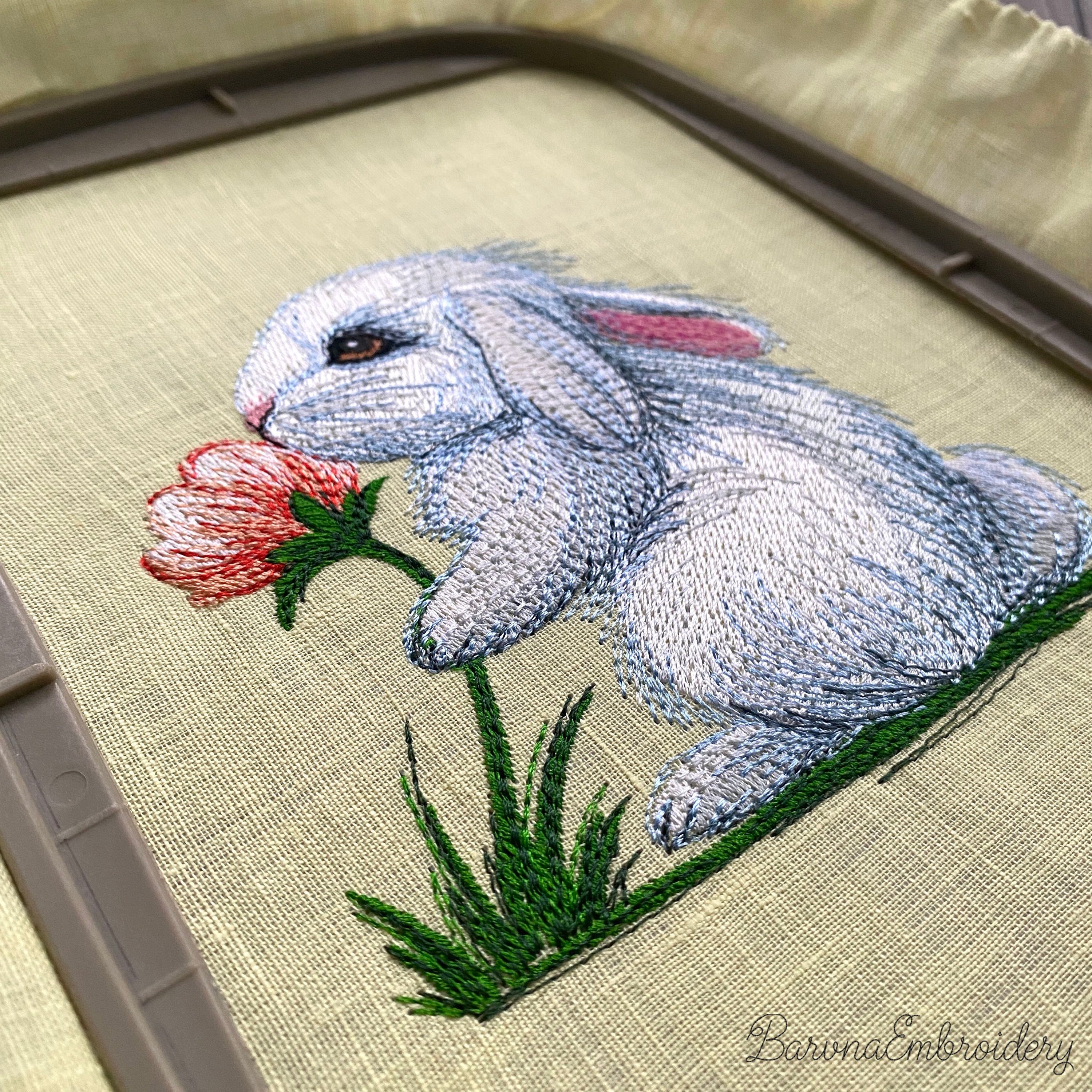 A collection of five high-quality machine embroidery designs: bunnies with butterflies, wildflowers, dandelions, and spring greenery in a realistic style.
