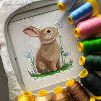 Sitting bunny embroidery design showing detailed stitched rabbit with fluffy texture, animal machine embroidery file