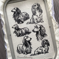 Long haired dachshund line art machine embroidery bundle with fourteen designs.