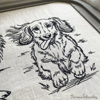Long haired dachshund running front view line art embroidery file.