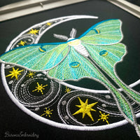 Four luna moth machine embroidery designs with celestial and decorative elements