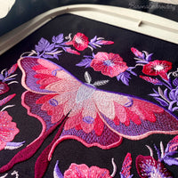 Four luna moth machine embroidery designs with celestial and decorative elements
