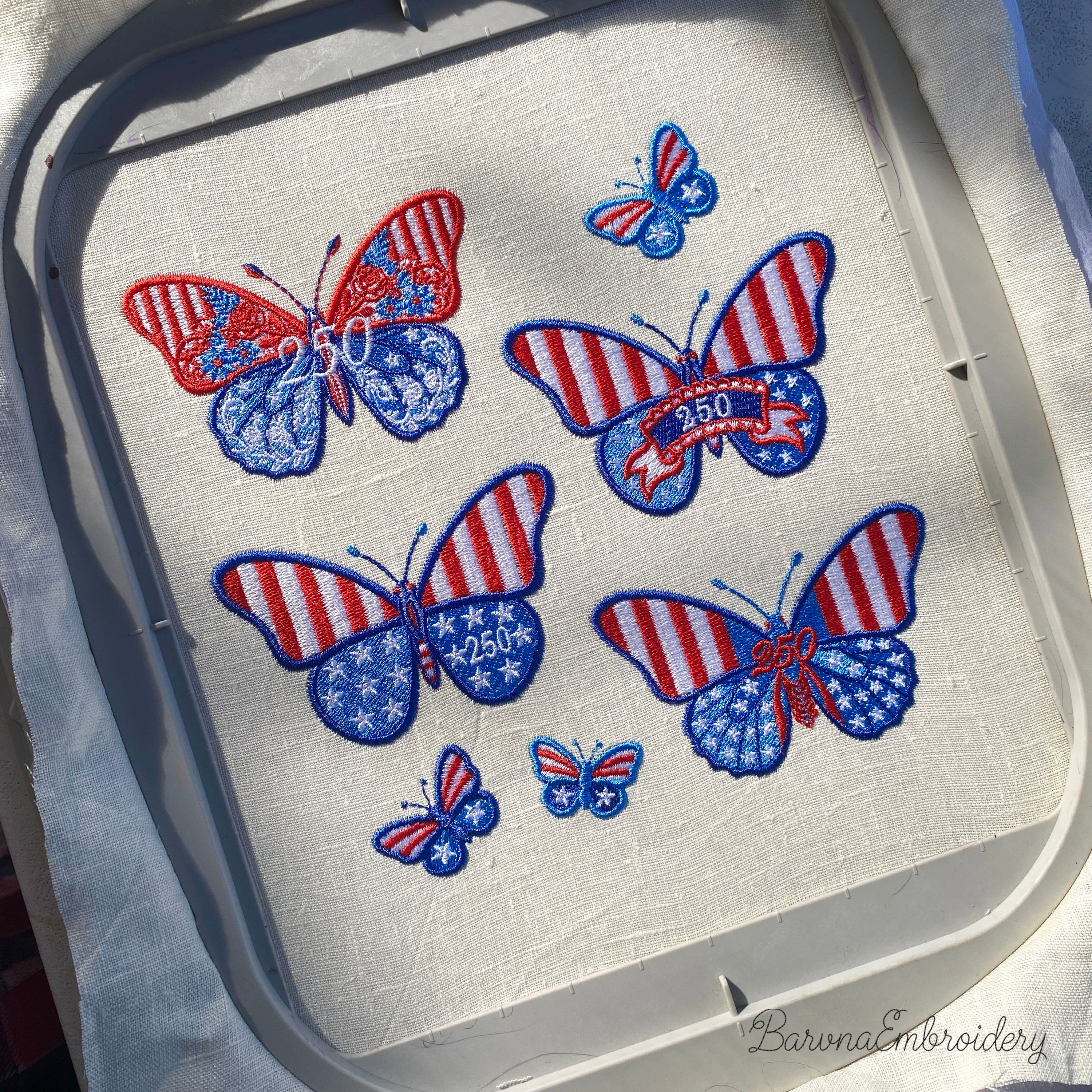 Patriotic butterfly machine embroidery designs in red white and blue with stars stripes and 250 celebration theme.
