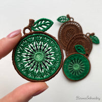 Four FSL kiwi embroidery designs in two styles — green kiwi cross-section and brown whole kiwi fruit — shown as mirrored pairs, Free Standing Lace machine embroidery pattern for earrings and pendants.