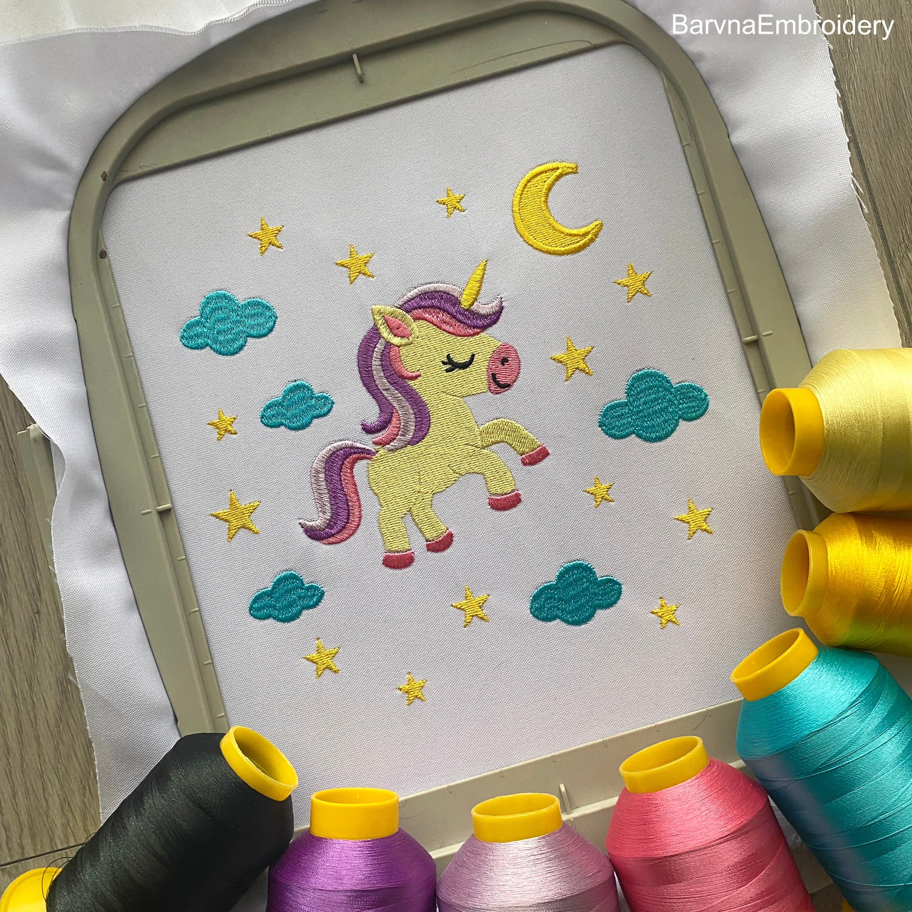 Cute unicorn embroidery design surrounded by stars, moon, and clouds – perfect for baby girl clothes, pillows, or nursery decor.