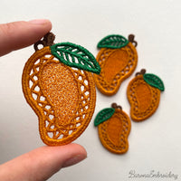 FSL mango embroidery designs in two sizes with mirrored pairs — golden lace body with green leaf — shown as design preview and finished stitched result, Free Standing Lace machine embroidery pattern for earrings and charms.