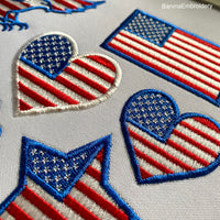 Machine embroidery design of the USA flag in the shape of a heart, perfect for patriotic projects.