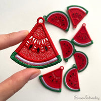 Two mirrored FSL watermelon slice earrings — a machine embroidery design in Free Standing Lace technique, showing red lace fill, black seeds, and green border with a hanging loop.