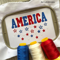 Machine embroidery design featuring the word “America” in bold red and blue letters with scattered red, white, and blue stars below, perfect for patriotic projects.