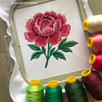 Machine embroidery design of a large pink peony flower with detailed stitching and green leaves, perfect for floral-themed projects and elegant decor.