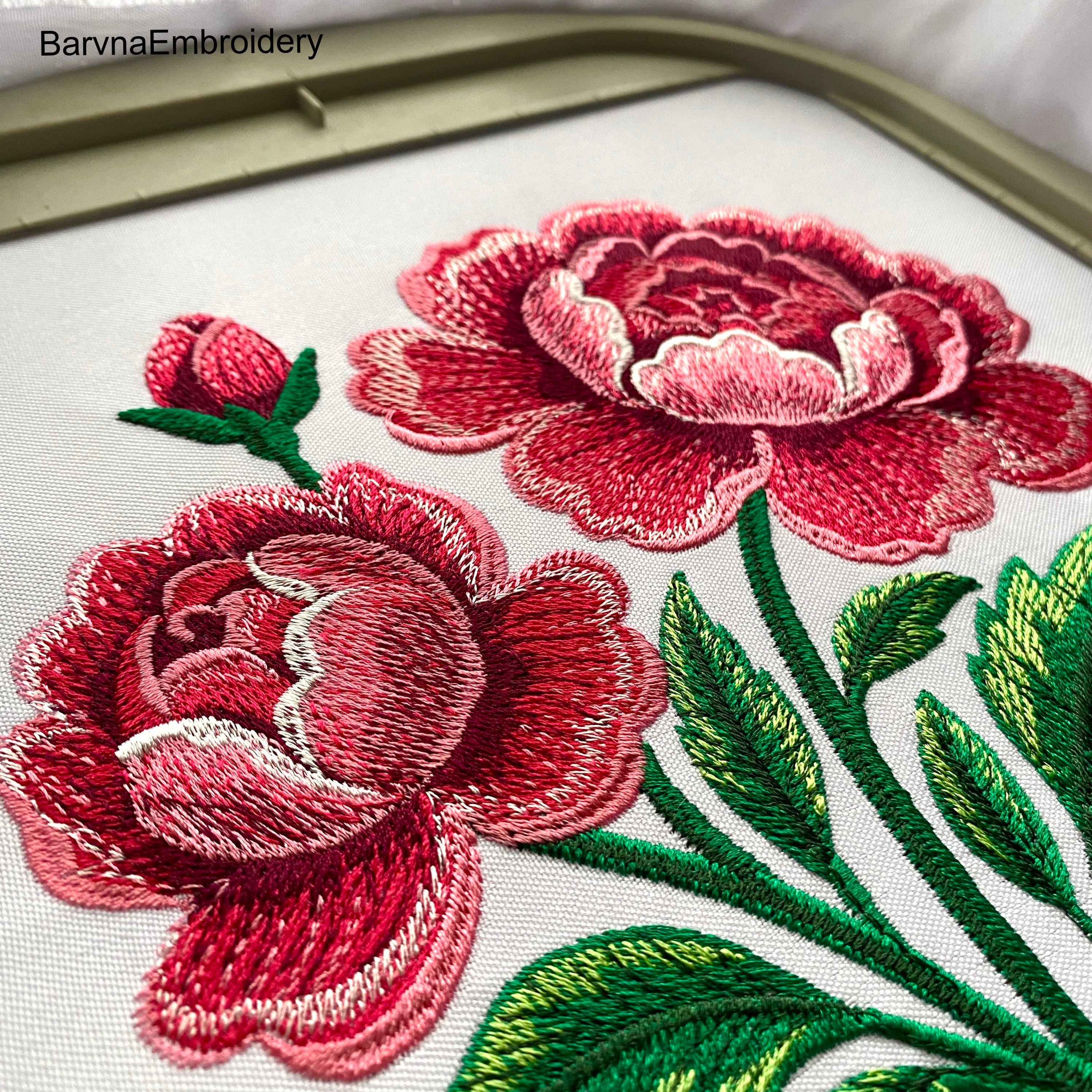 Machine embroidery design of blooming pink peonies with green leaves and a flower bud. Detailed satin and tatami stitches for elegant floral projects.