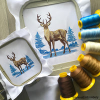 Winter landscape and Deer embroidery designs.