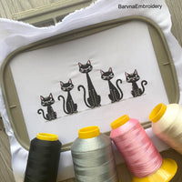 Five black cats sitting in a row Halloween machine embroidery design for T-shirts, bags, and pillows.