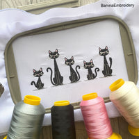 Five spooky black cats sitting in a row – cute Halloween machine embroidery design for clothes, bags, and home décor.
