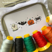 Halloween embroidery design with ghost, bat, pumpkin, and spider in a cute spooky style – perfect for seasonal projects.