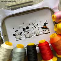 Halloween embroidery design with four cute funny ghosts – perfect for spooky seasonal sewing projects.