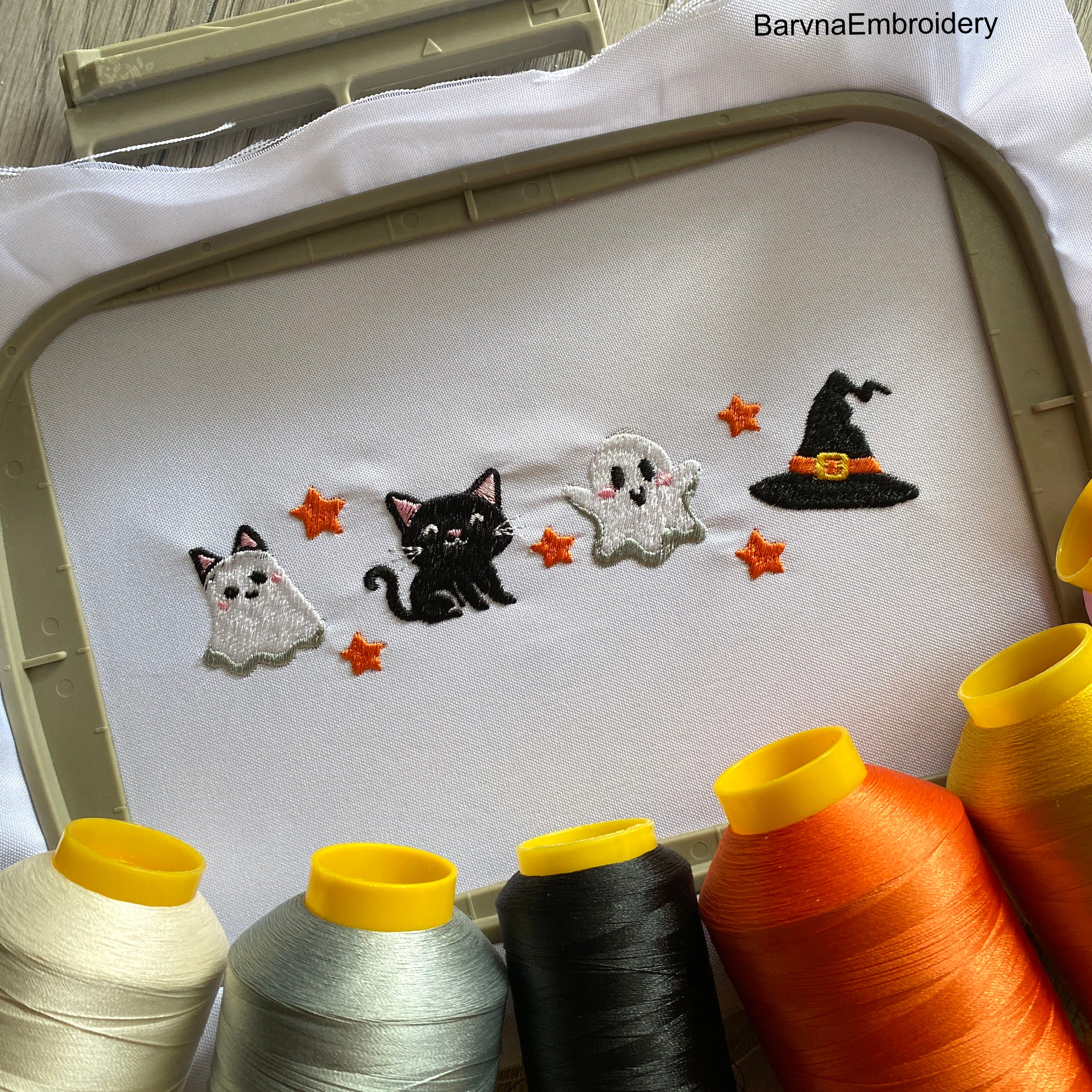 Halloween embroidery design with four cute funny ghosts and cat – perfect for spooky seasonal sewing projects.