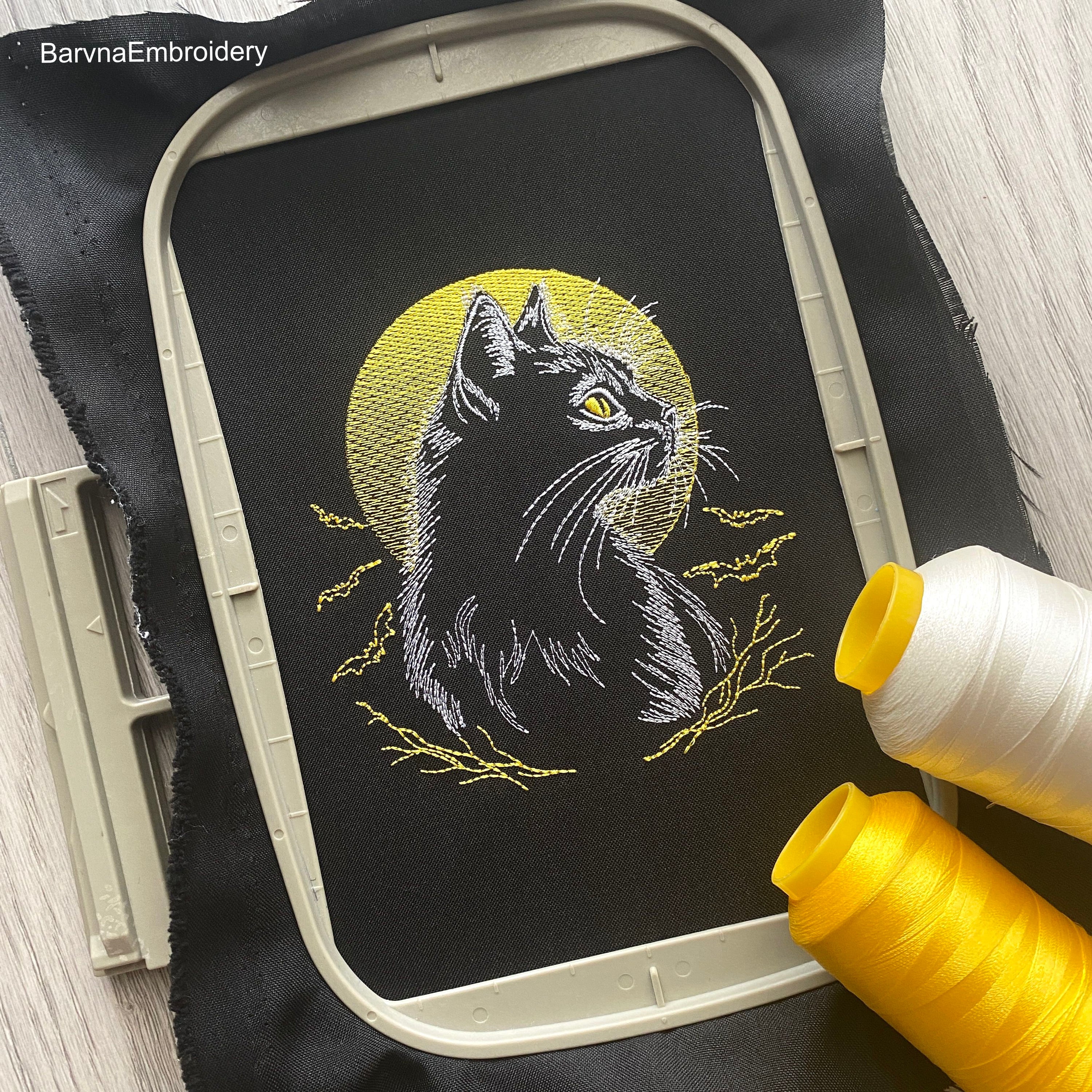 Halloween machine embroidery design with cat on the moon and flying bats – light outline, perfect for dark fabric.