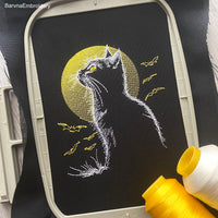 Spooky Halloween embroidery design with cat silhouette, moon, and bats – perfect for stitching on dark fabric.