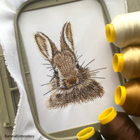 Cute bunny outline machine embroidery design in light line stitch – perfect for clothes, bags, and home décor.