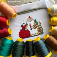 Festive Christmas embroidery design with a funny Santa cat – digital file for holiday machine embroidery projects.