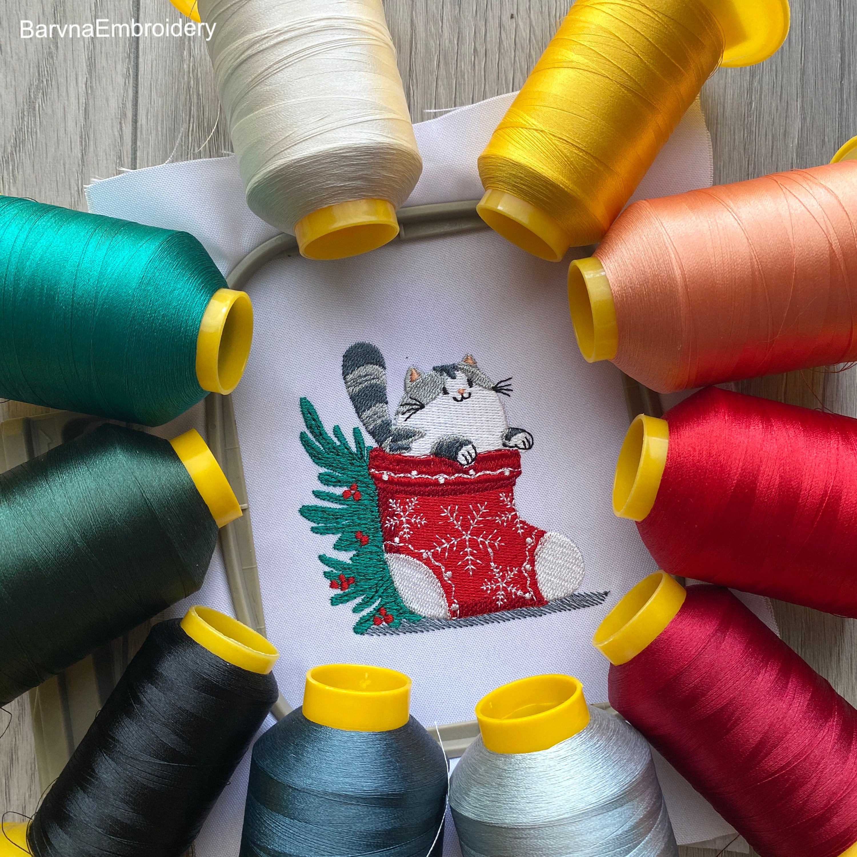 Festive Christmas embroidery design with a cute cat in a holiday stocking – digital file for machine embroidery projects.