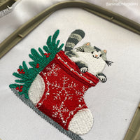 Festive Christmas embroidery design with a cute cat in a holiday stocking – digital file for machine embroidery projects.