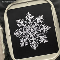 Elegant snowflake machine embroidery design – digital file for festive and winter-themed projects.