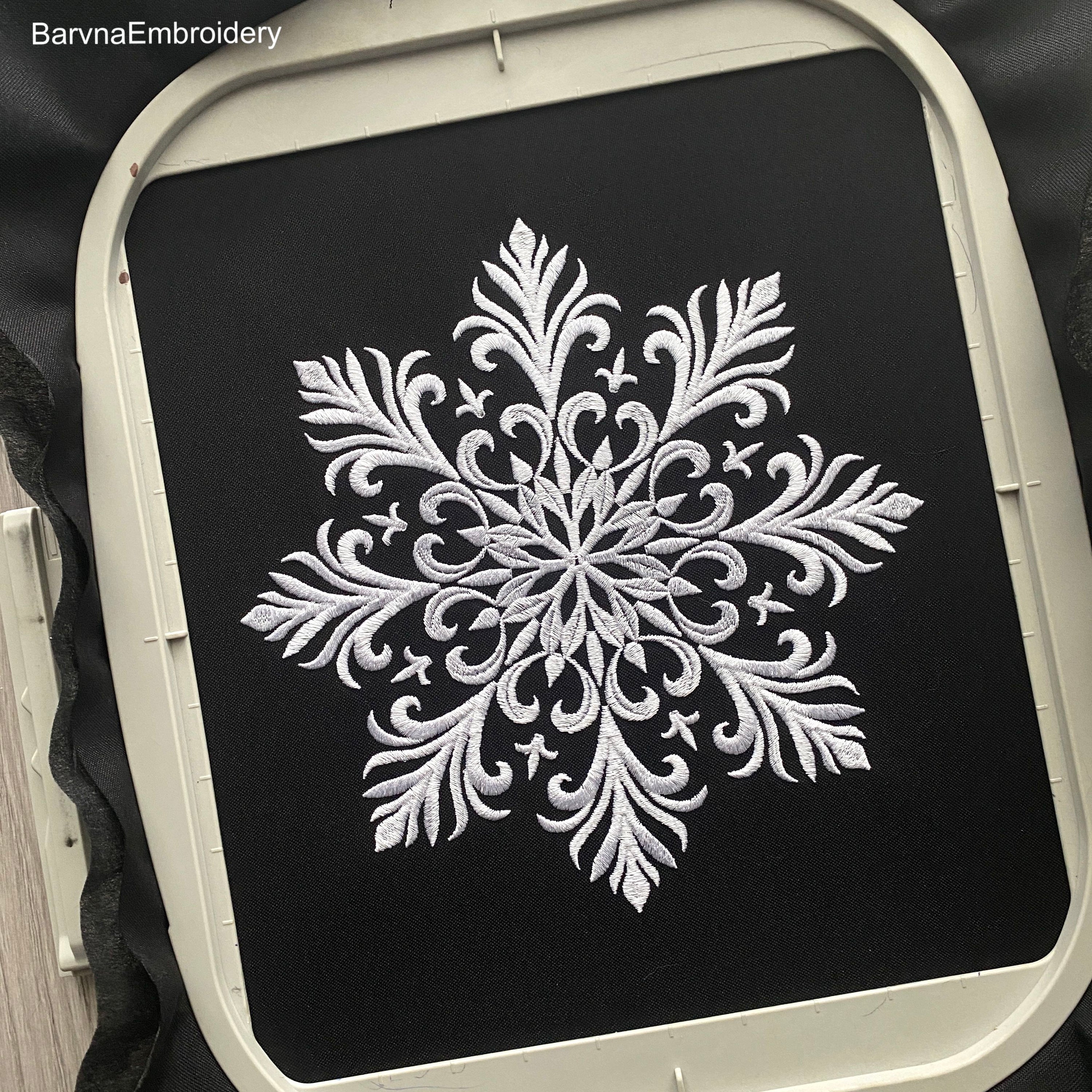 Elegant snowflake machine embroidery design – digital file for festive and winter-themed projects.