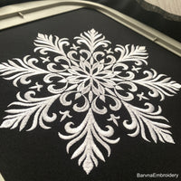 Elegant snowflake machine embroidery design – digital file for festive and winter-themed projects.