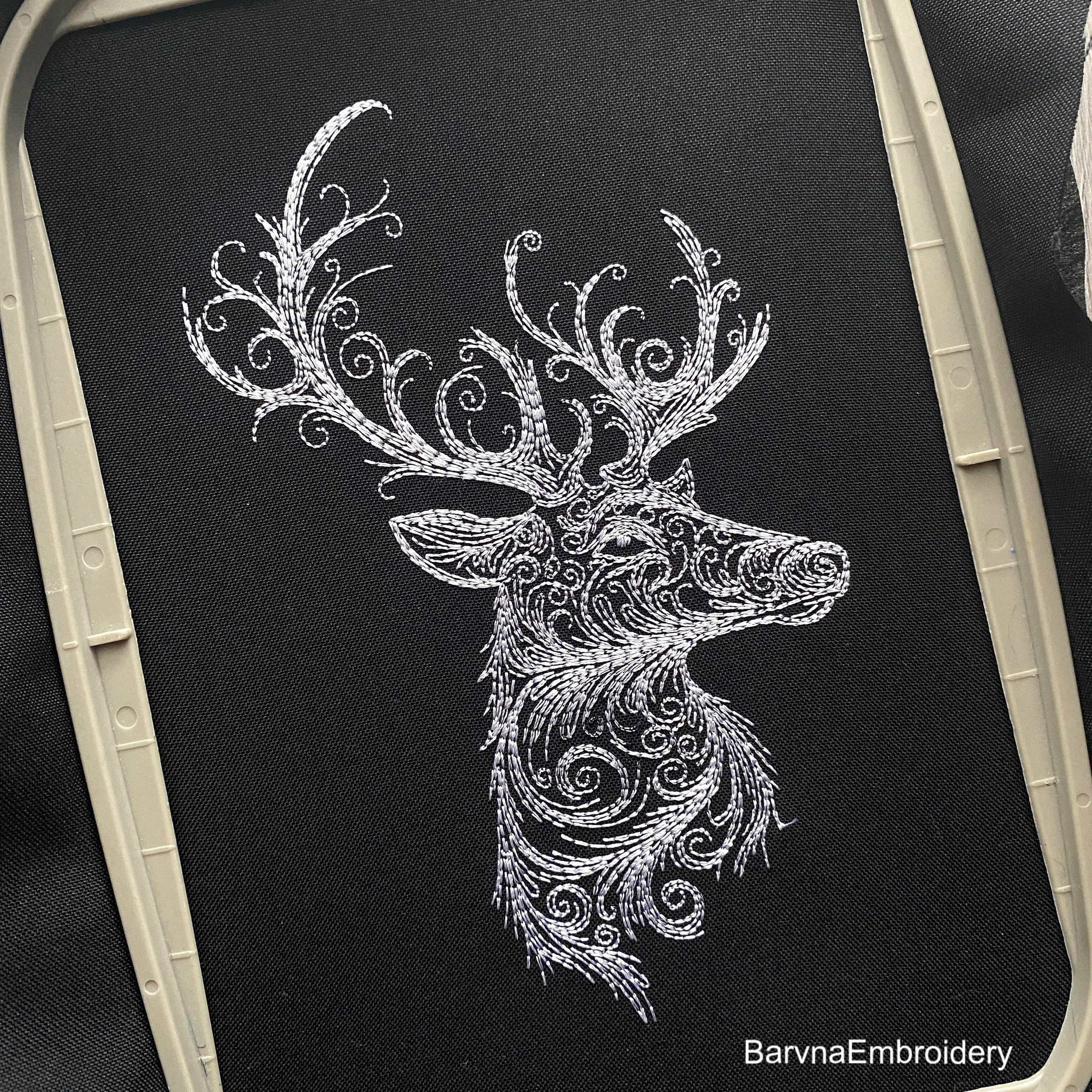Deer head side view embroidery design with swirls – digital one-color embroidery file for Christmas and winter decor.