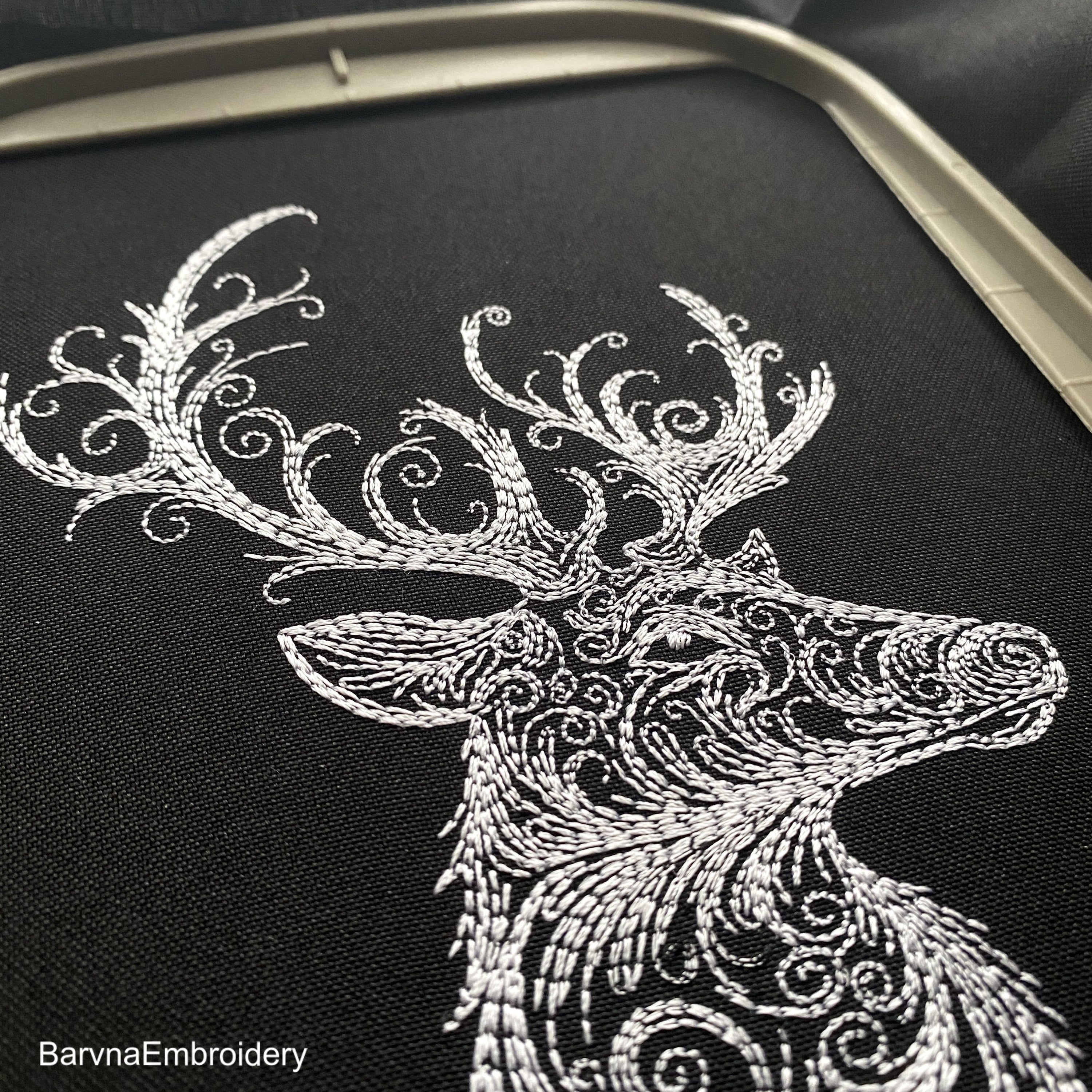 Deer head side view embroidery design with swirls – digital one-color embroidery file for Christmas and winter decor.