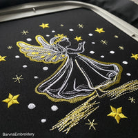 Machine embroidery design of angel girl holding a star, surrounded by sparkling stars, ideal for Christmas or baby projects.