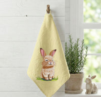 Cute bunny machine embroidery design sitting on grass, spring animal embroidery pattern for kids and seasonal projects