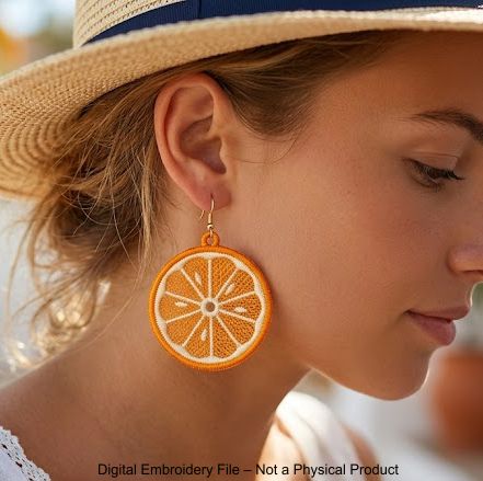 Three pairs of FSL orange embroidery designs — half-slice, whole orange with green leaves, and round citrus cross-section — Free Standing Lace machine embroidery pattern for earrings and pendants.