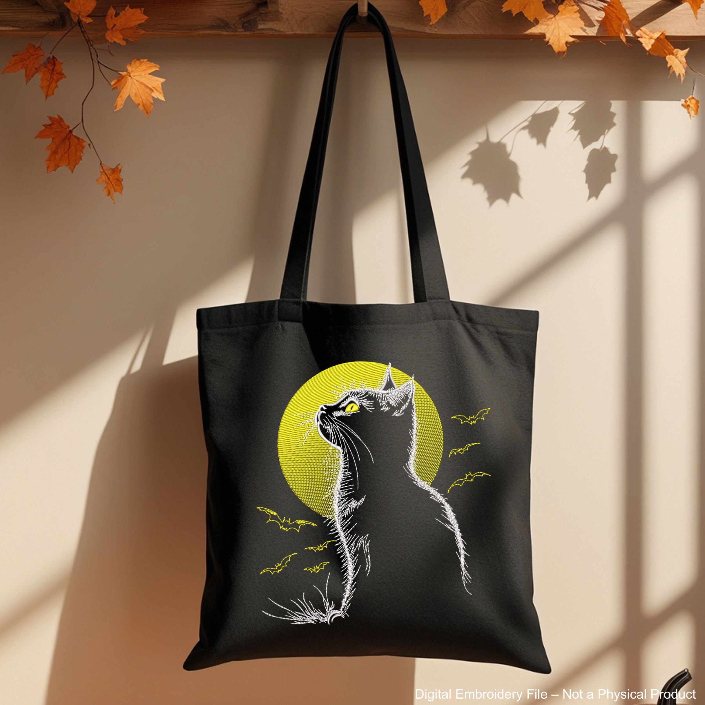Spooky Halloween embroidery design with cat silhouette, moon, and bats – perfect for stitching on dark fabric.