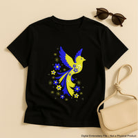 Blue and yellow flying bird embroidery design with stars and flowers trailing from wings – symbolic Ukrainian patriotic motif.