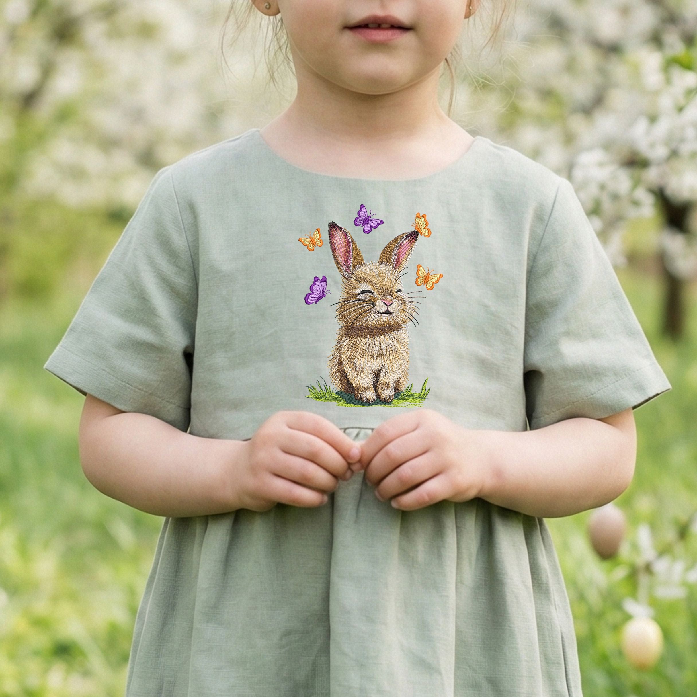 A collection of five high-quality machine embroidery designs: bunnies with butterflies, wildflowers, dandelions, and spring greenery in a realistic style.