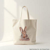 Cute bunny outline machine embroidery design in light line stitch – perfect for clothes, bags, and home décor.