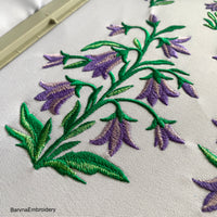 This digital embroidery design features a delicate bellflower branch.