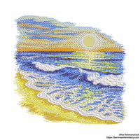 Machine embroidery design of a seaside landscape with golden sand, gentle ocean waves, and a vibrant sunset.