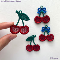Hand holding an actual red cherry FSL stitch-out with green leaf; bow variation shown in the background