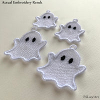 Four actual white Ghost FSL stitch-outs with black oval eyes, raised arms and hanging loops