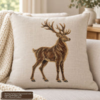 Cream linen cushion mockup featuring a brown stag deer embroidery design, styled on a sofa beside a knitted blanket.