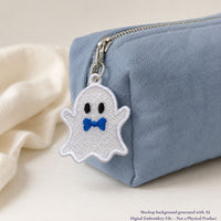 White Ghost Boy FSL zipper charm with a blue bow tie attached to a light blue fabric pouch