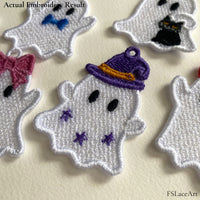 Actual white Ghost with Witch Hat FSL embroidery displayed among other finished Halloween ghost designs