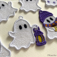 Actual white ghost FSL embroidery holding a purple lantern with a glowing yellow center